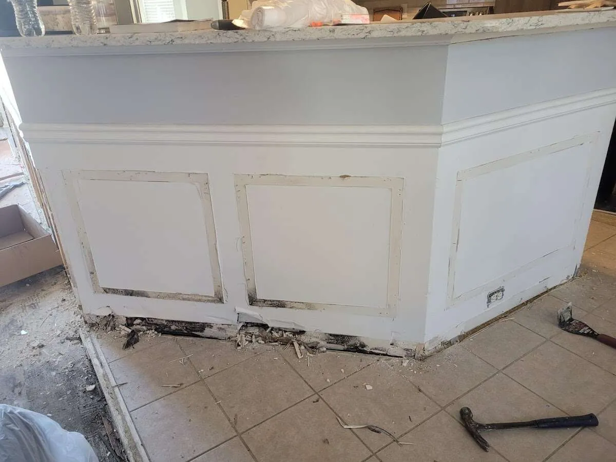 Water damage and mold on kitchen during Storm Damage Restoration in Lake Shore